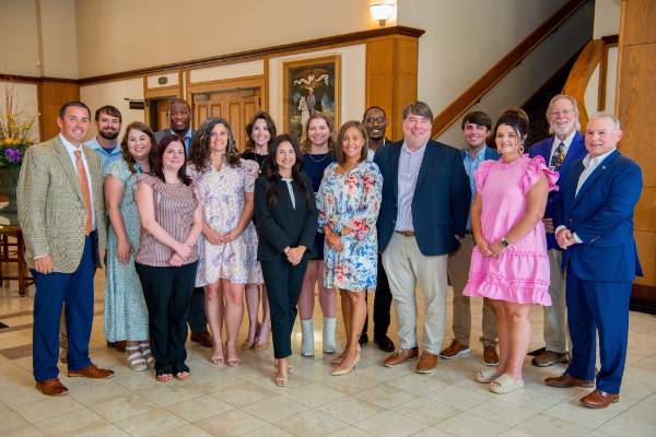 2023-2024 CAEP graduates at a celebration at the Lod Cook Alumni Center