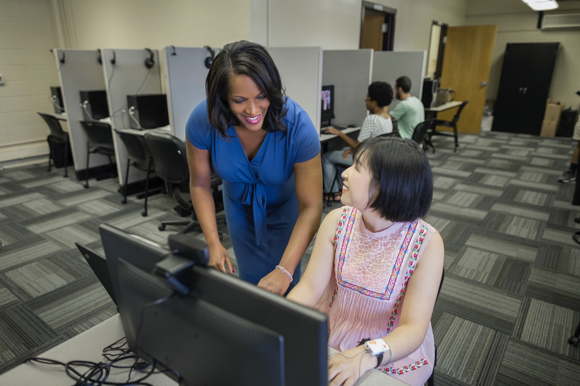 Professor talking with research participant