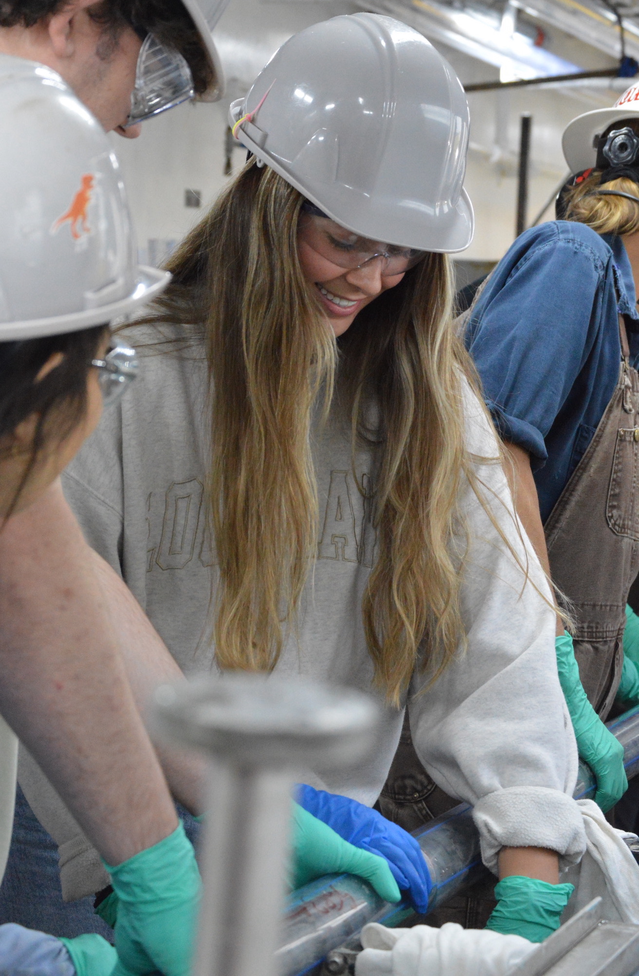 Danielle Noto cutting core sediments