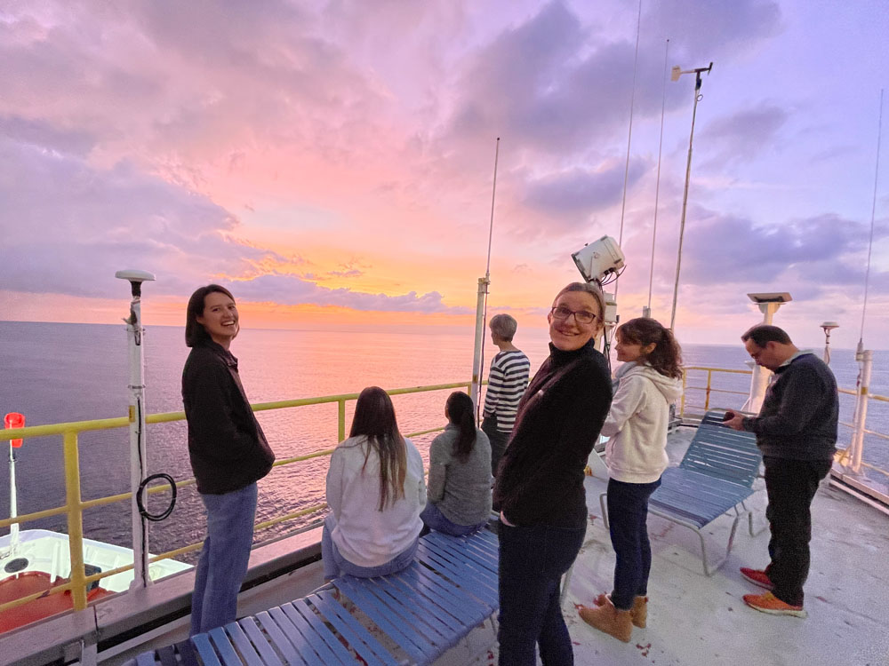 Scientists watching the sunrise