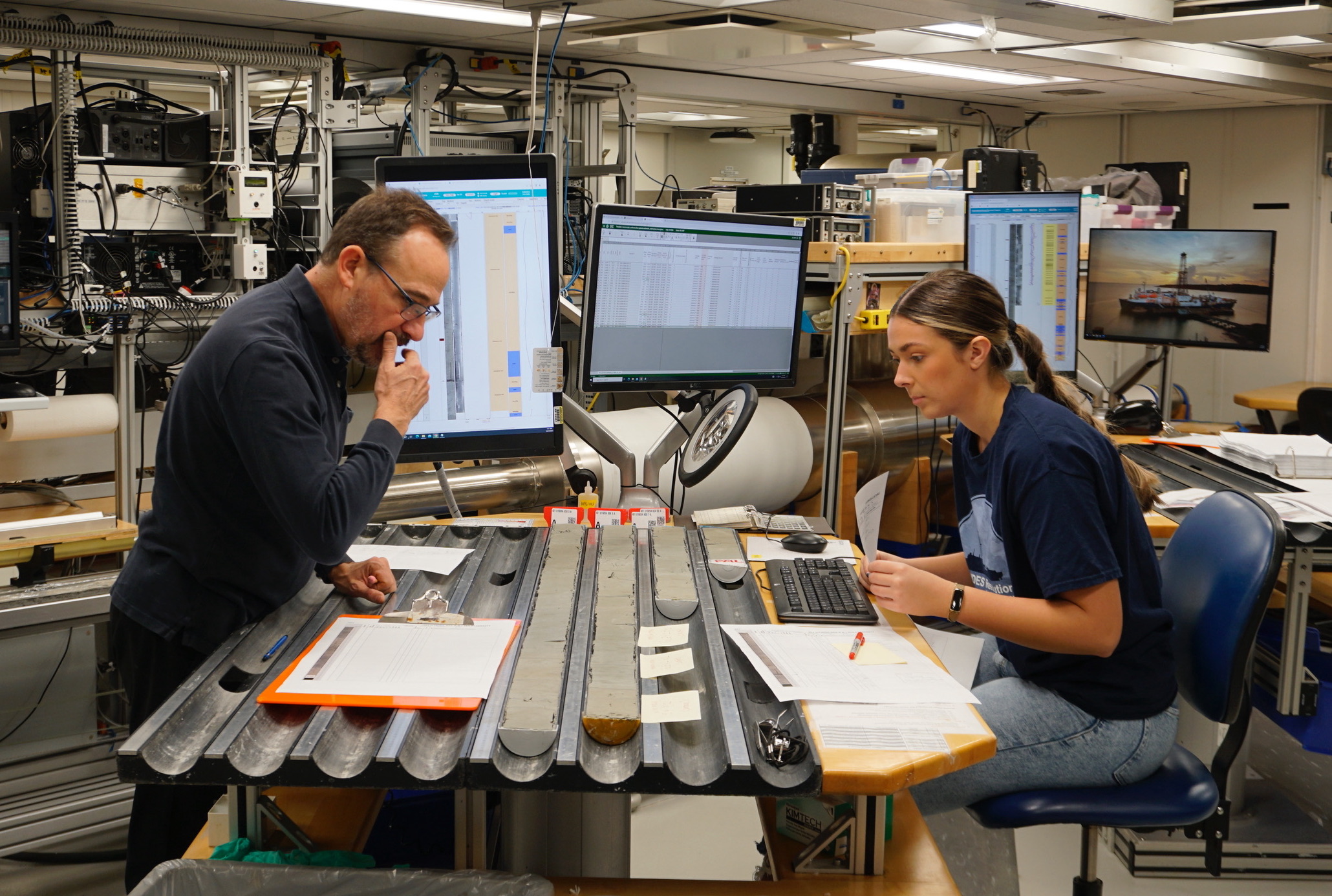 Danielle and another sedimentologist describing cores