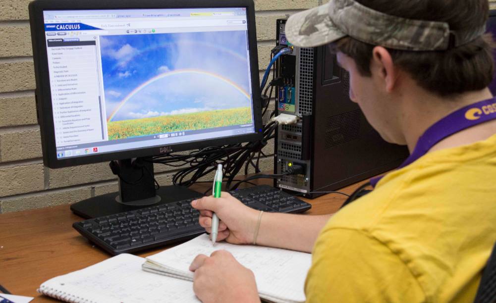 student working on computer