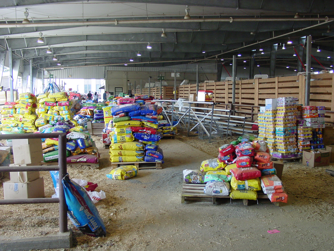 stacks of pet food and supplies